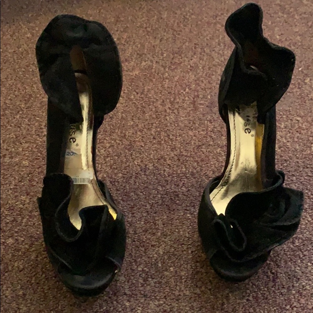 Black ruffled heels
